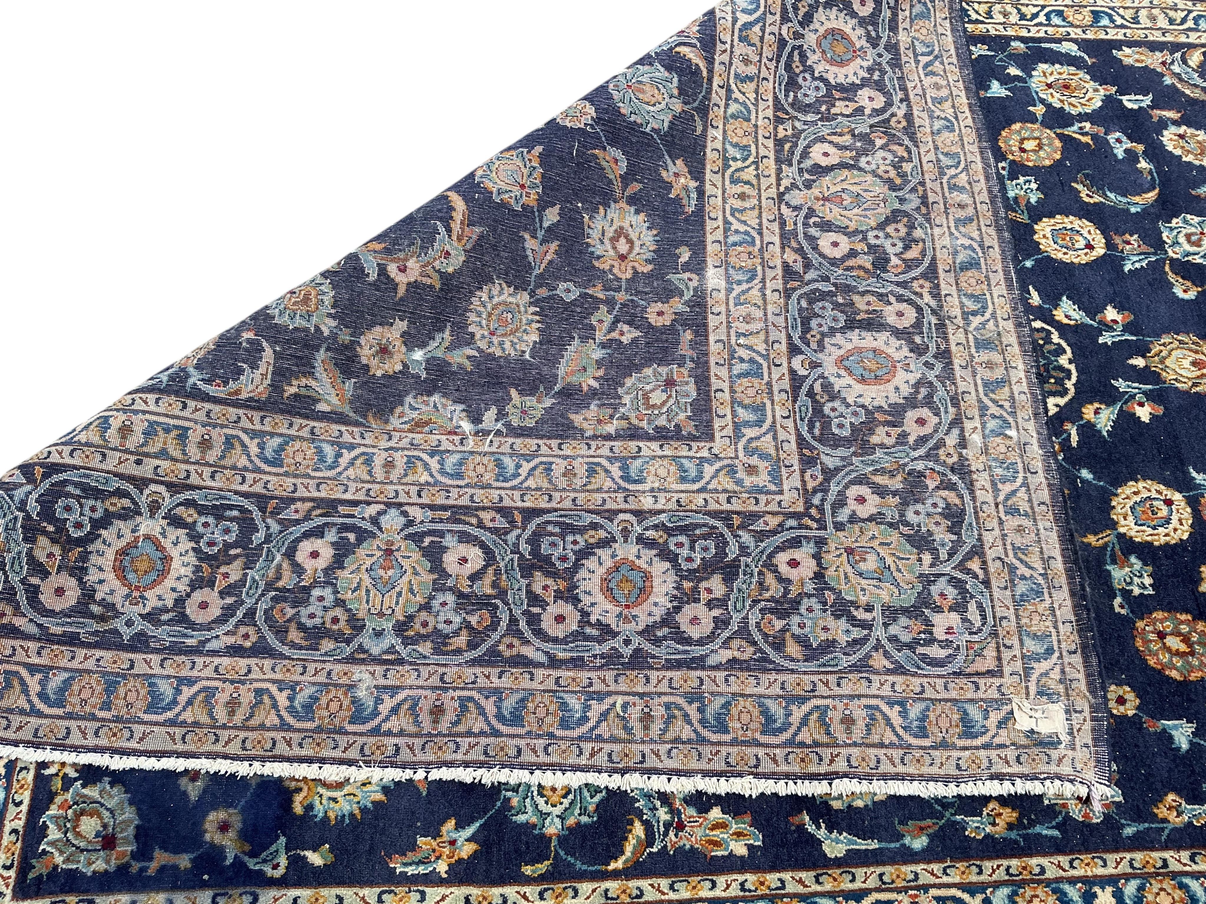 A Tabriz ground carpet, 330 x 219cm